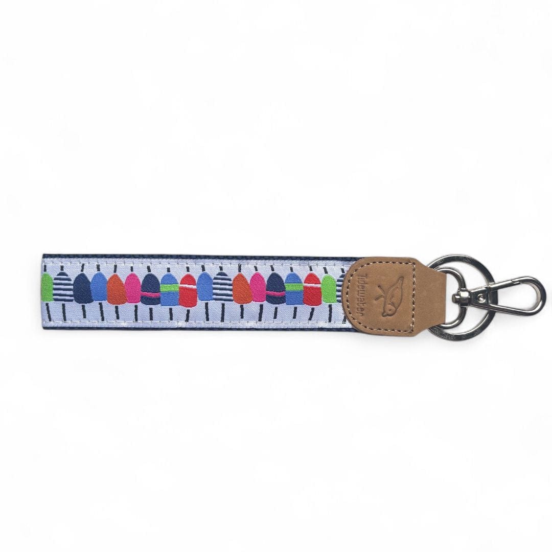 Colorful keychain featuring a buoyline design with various buoy shapes and a leather strap for easy attachment.