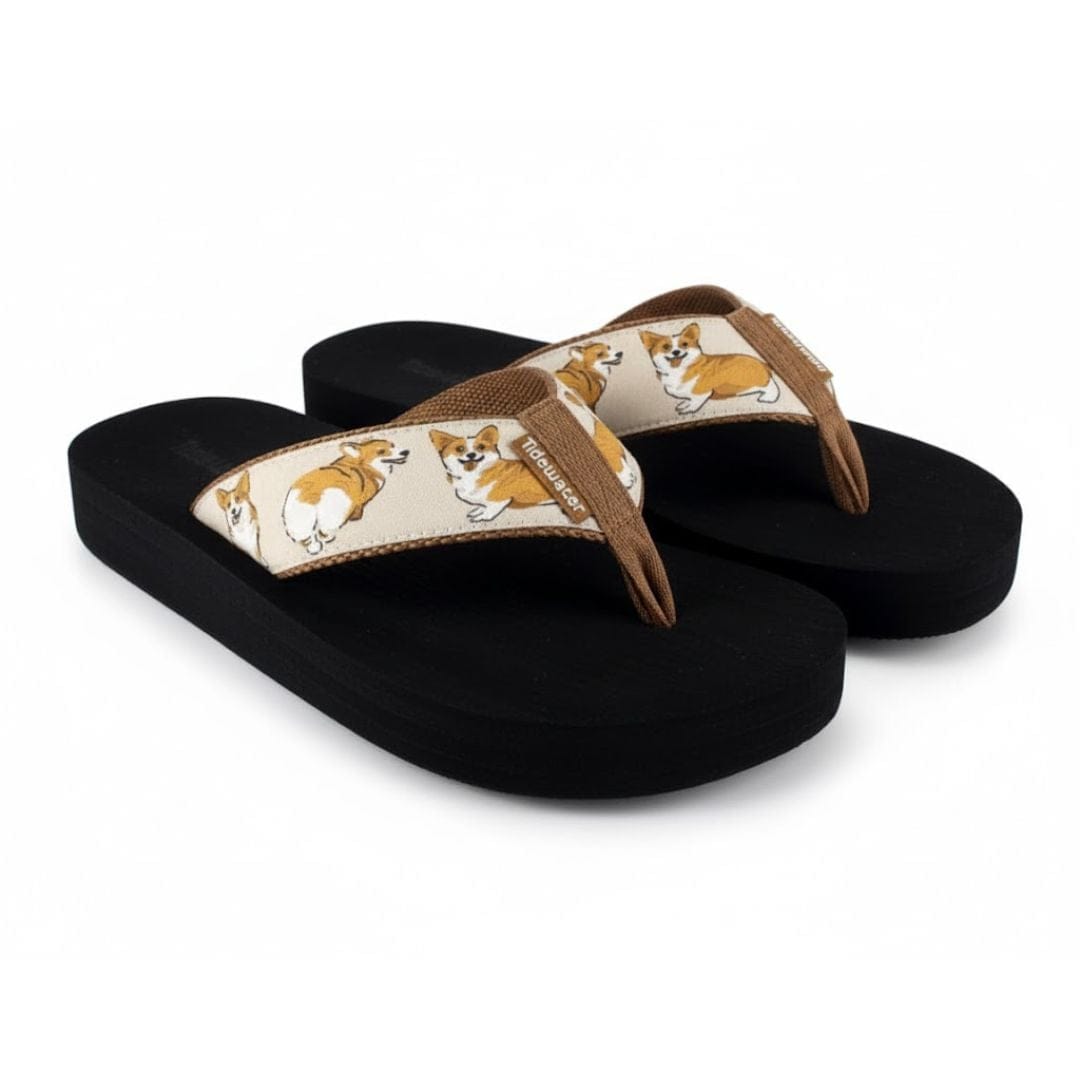 Corgi-themed flip-flops with a black sole and a patterned strap featuring playful corgi illustrations.