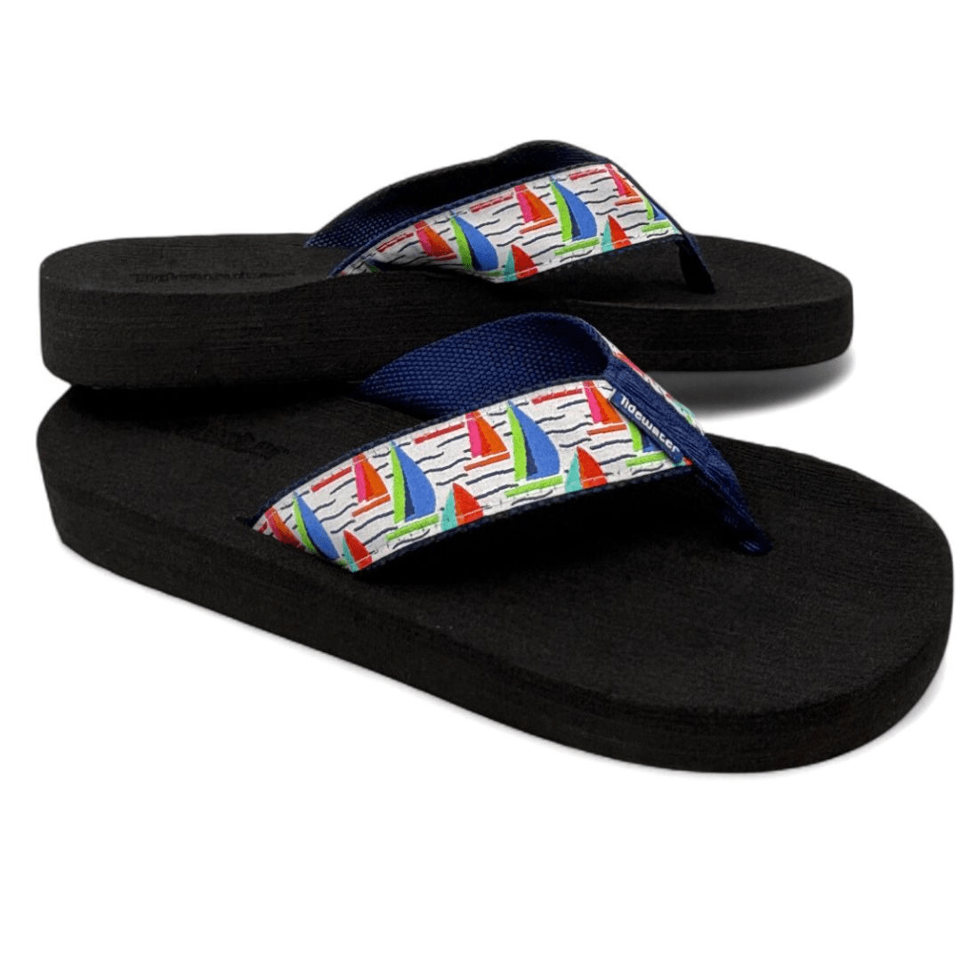 Tidewater Sandals Full Sail White featuring a colorful sailboat print strap and a comfortable black sole.