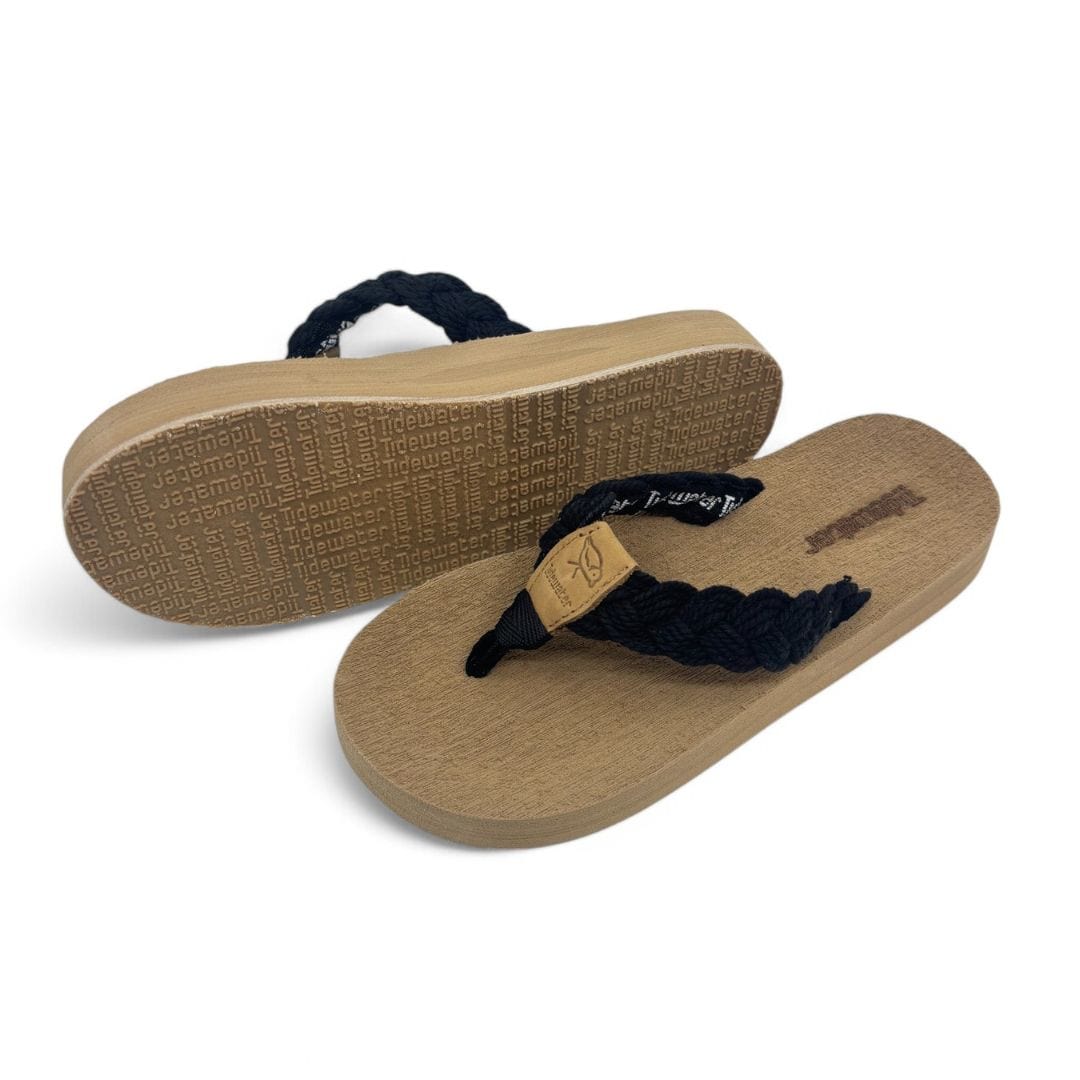 Comfortable Harbor Black flip-flops featuring a braided strap and textured sole, perfect for casual summer outings.