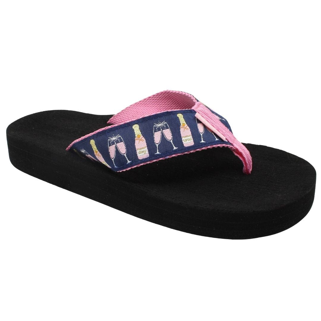 Navy flip-flop sandal featuring a pink champagne bottle pattern and a comfortable black sole, perfect for summer outings.