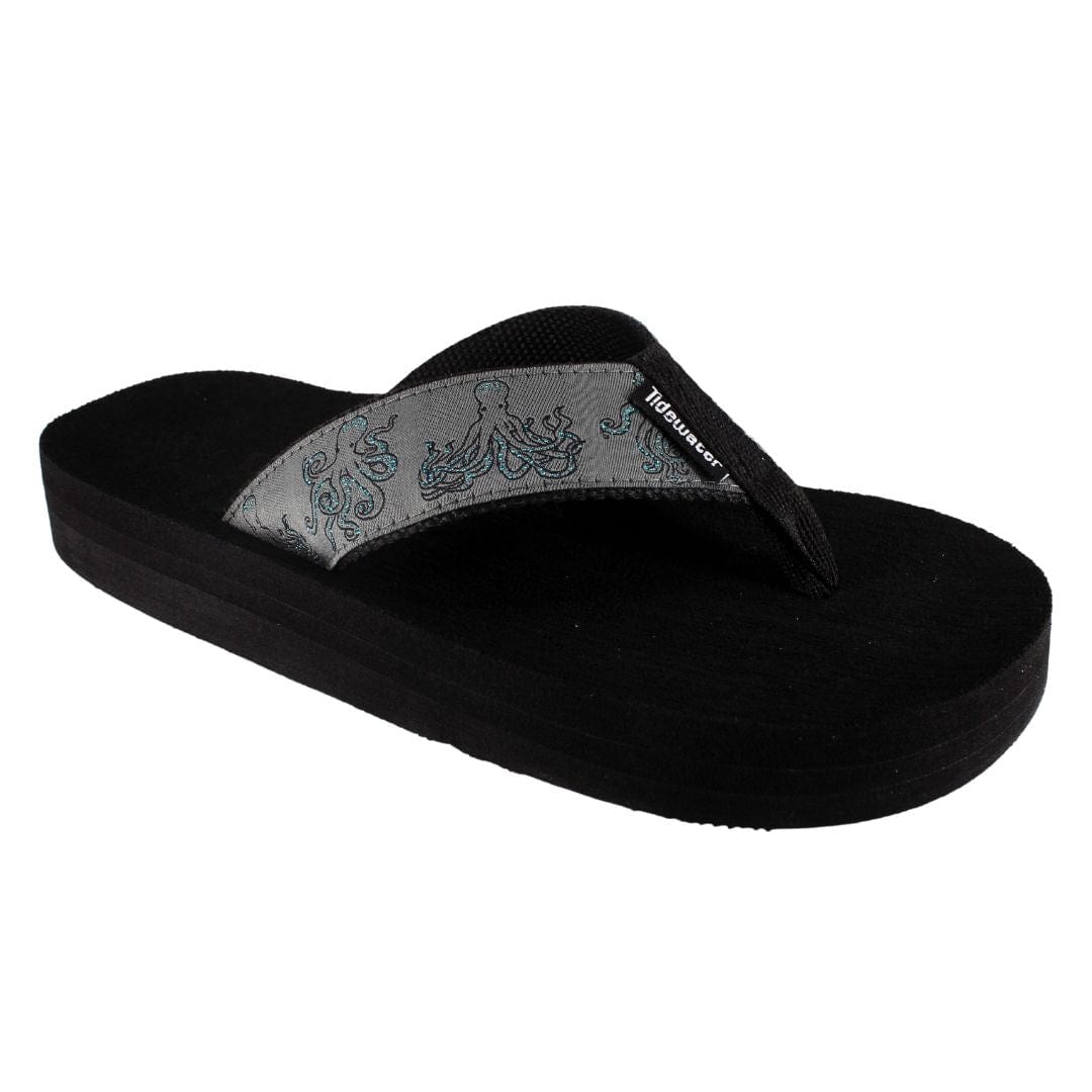 Black sandal with a gray insole on a white background
