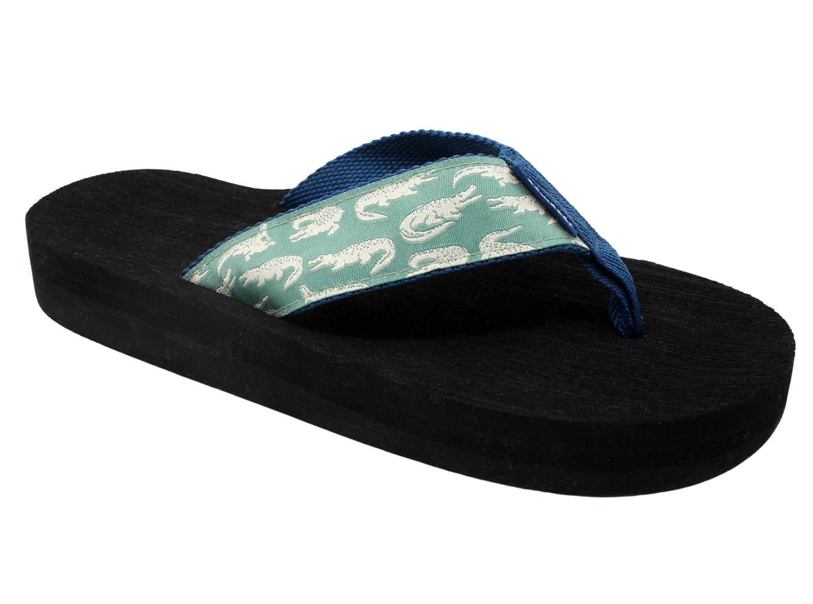 Casual black sandal with a soft green and white alligator-patterned strap and a sturdy black sole.
