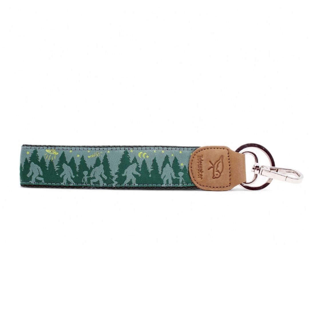 Celebrate your love for the outdoors with this Bigfoot-themed keychain. Featuring a whimsical forest design, it's a perfect gift for adventurers!