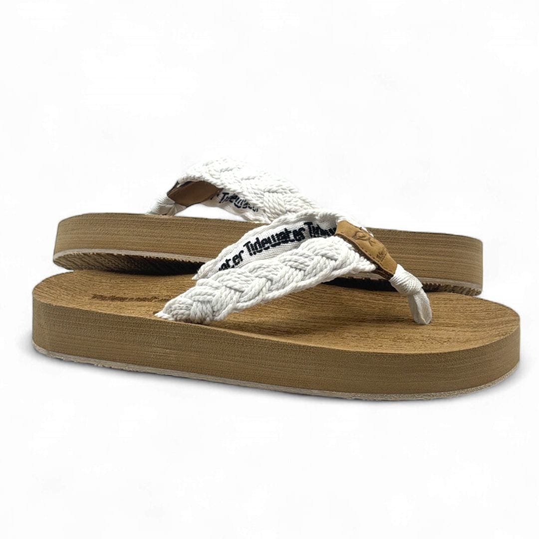 Harbor White sandals featuring a braided white strap and a natural wood-like sole, perfect for casual summer outings.