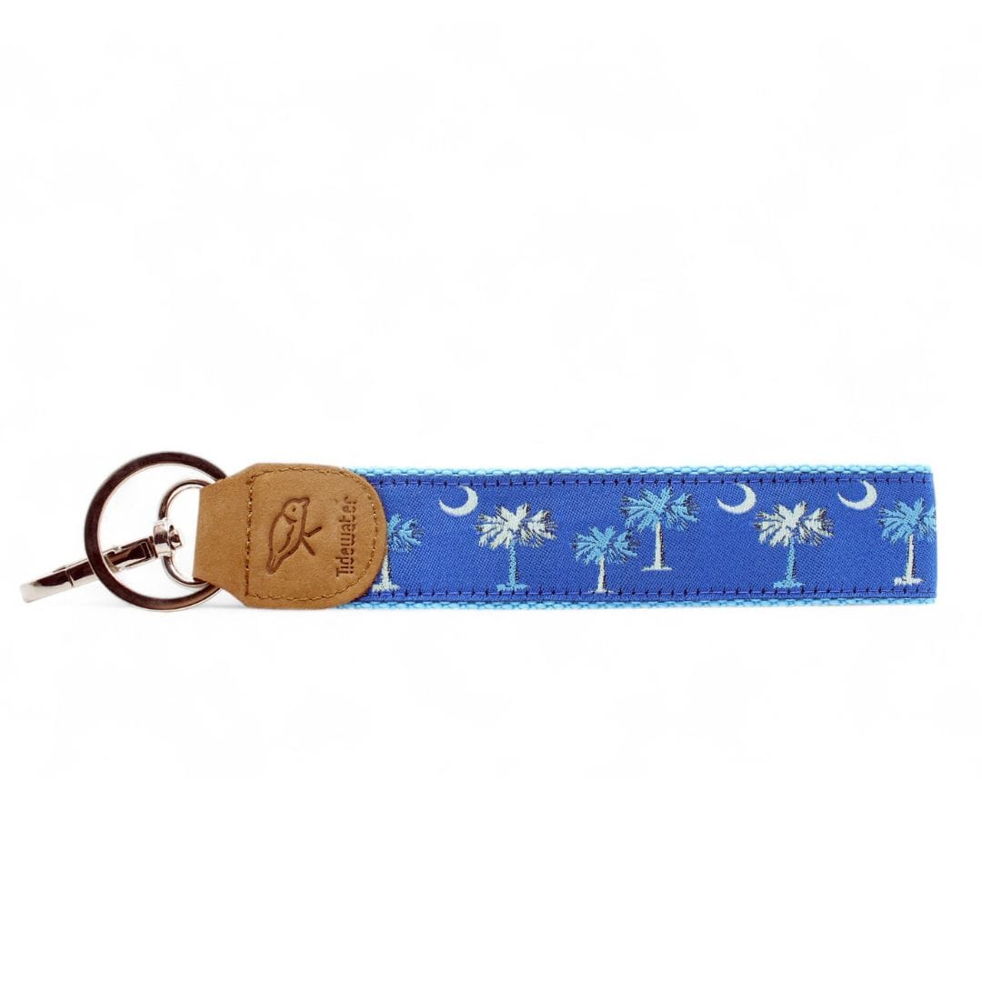 Add a touch of coastal charm to your keys with this blue palmetto tree keychain. Durable and stylish, it&