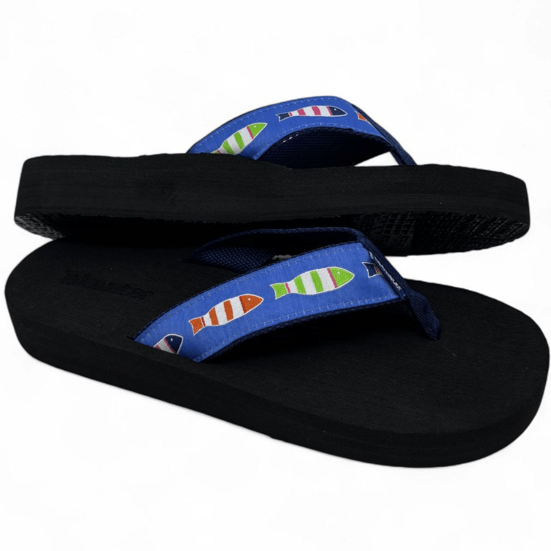 Blue flip-flops featuring a colorful fish pattern on the straps, ideal for beach or casual summer wear.