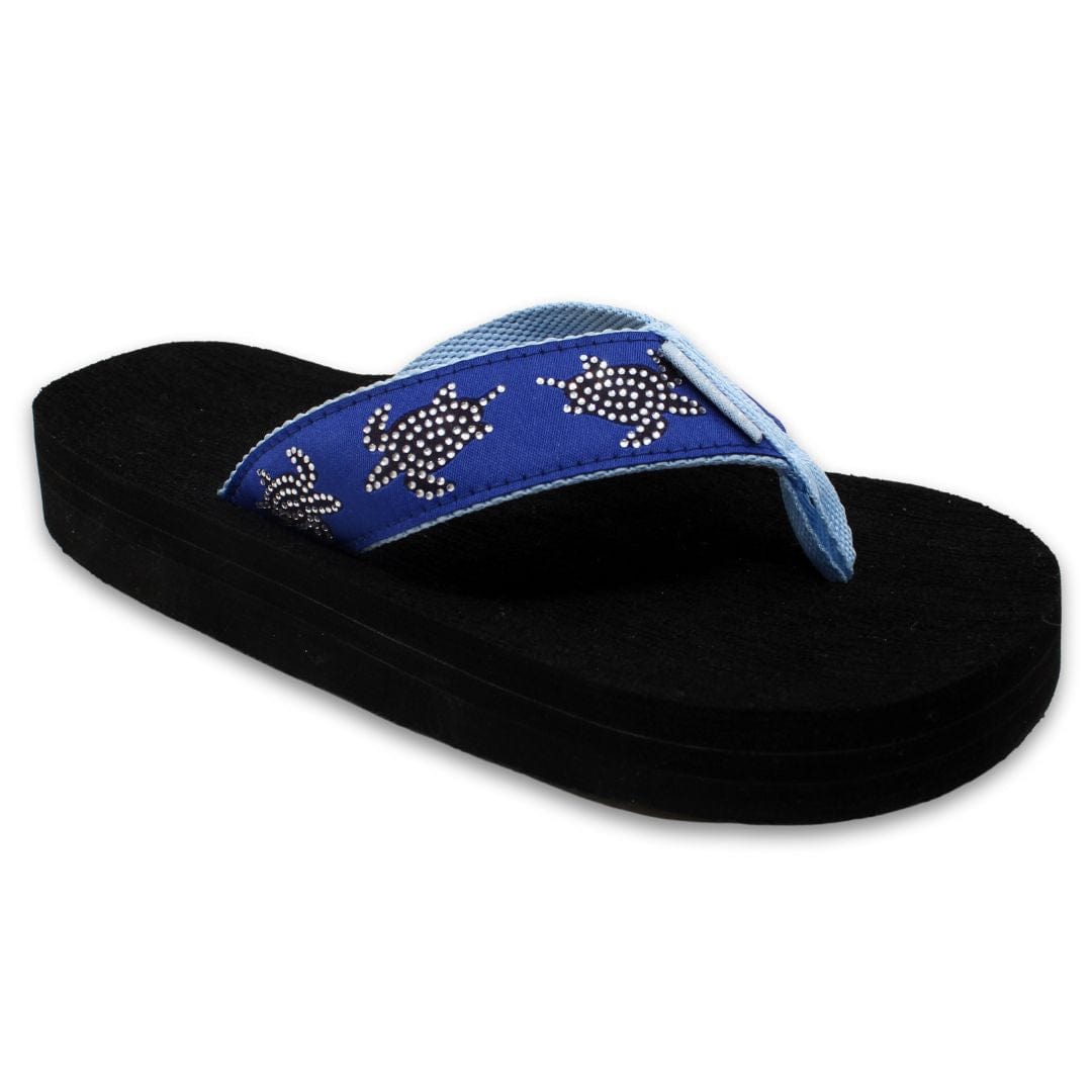 Blue flip-flops featuring turtle designs on the strap, set on a black platform sole for comfort and style.