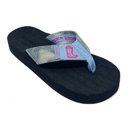 Denim flip flop sandal with pink embroidered cowgirl boot design on strap and black comfort footbed

